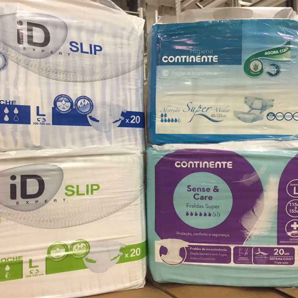 Stacked packages of adult diapers from brands iD Expert Slip and Continente Sense & Care with size L and features like absorption and leakage protection.