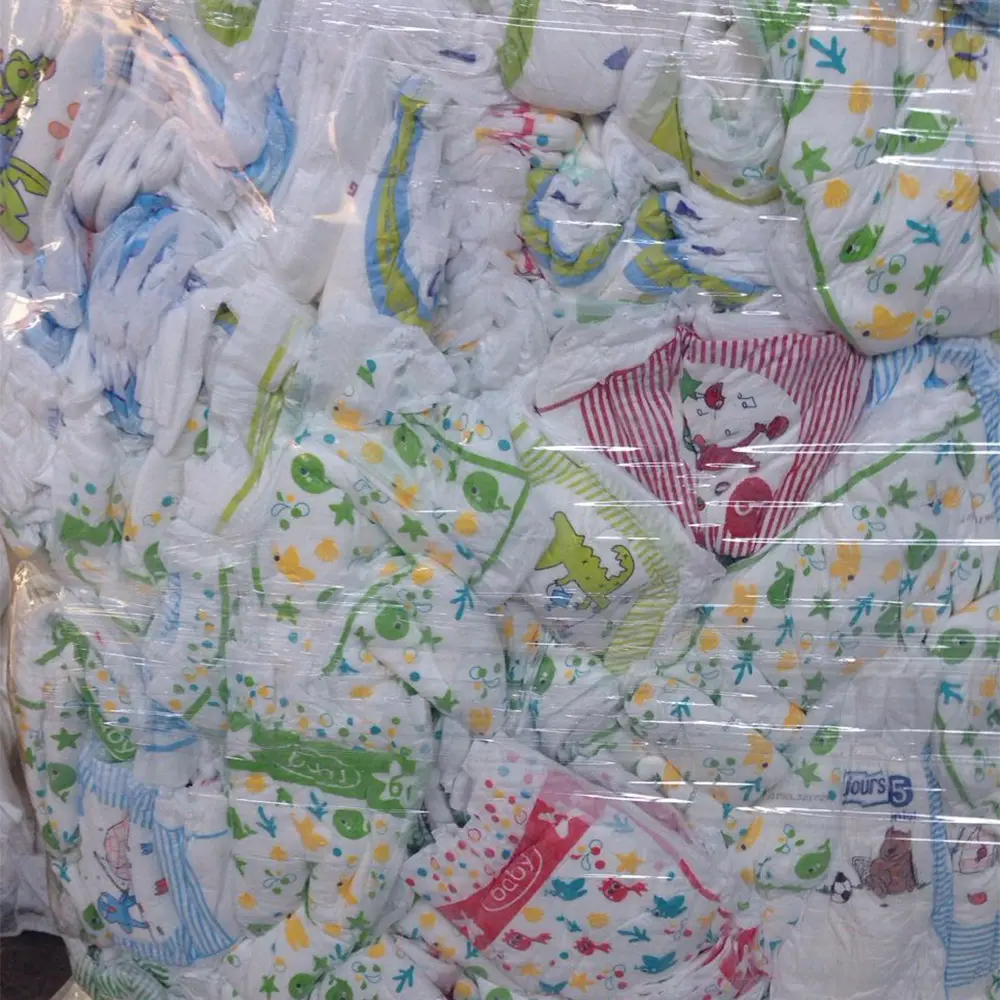 Pack of assorted baby diapers with colorful animal and pattern prints wrapped in clear plastic.