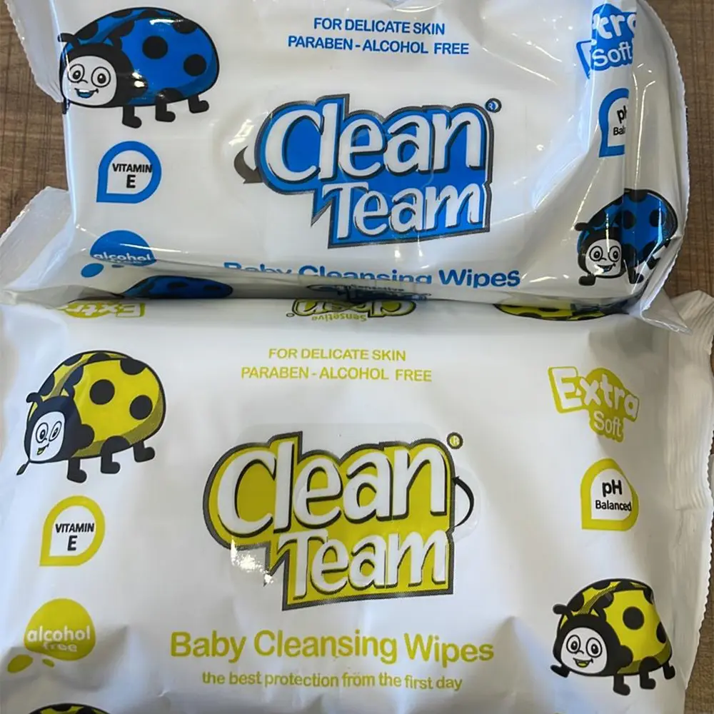 Two packs of Clean Team baby cleansing wipes, one with blue and black ladybug design and one with yellow and black ladybug design, labeled for delicate skin, paraben and alcohol free.